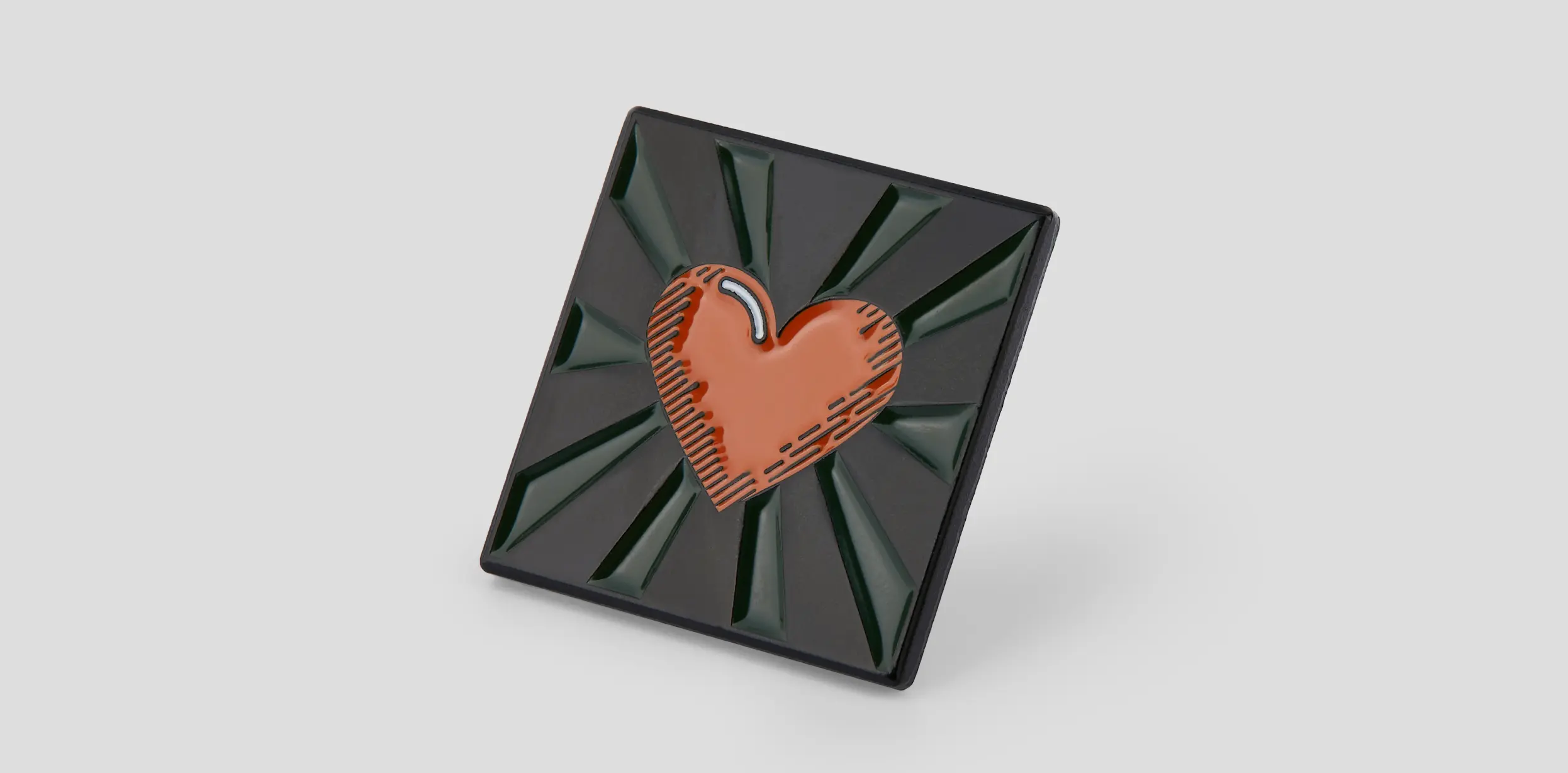 Large square pin featuring a heart design with 3D details, showcasing vibrant colors and intricate craftsmanship.