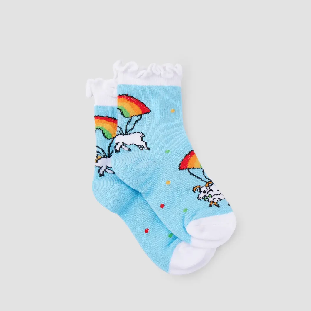 Blue children's socks featuring playful unicorns with rainbow umbrellas and white ruffled tops.