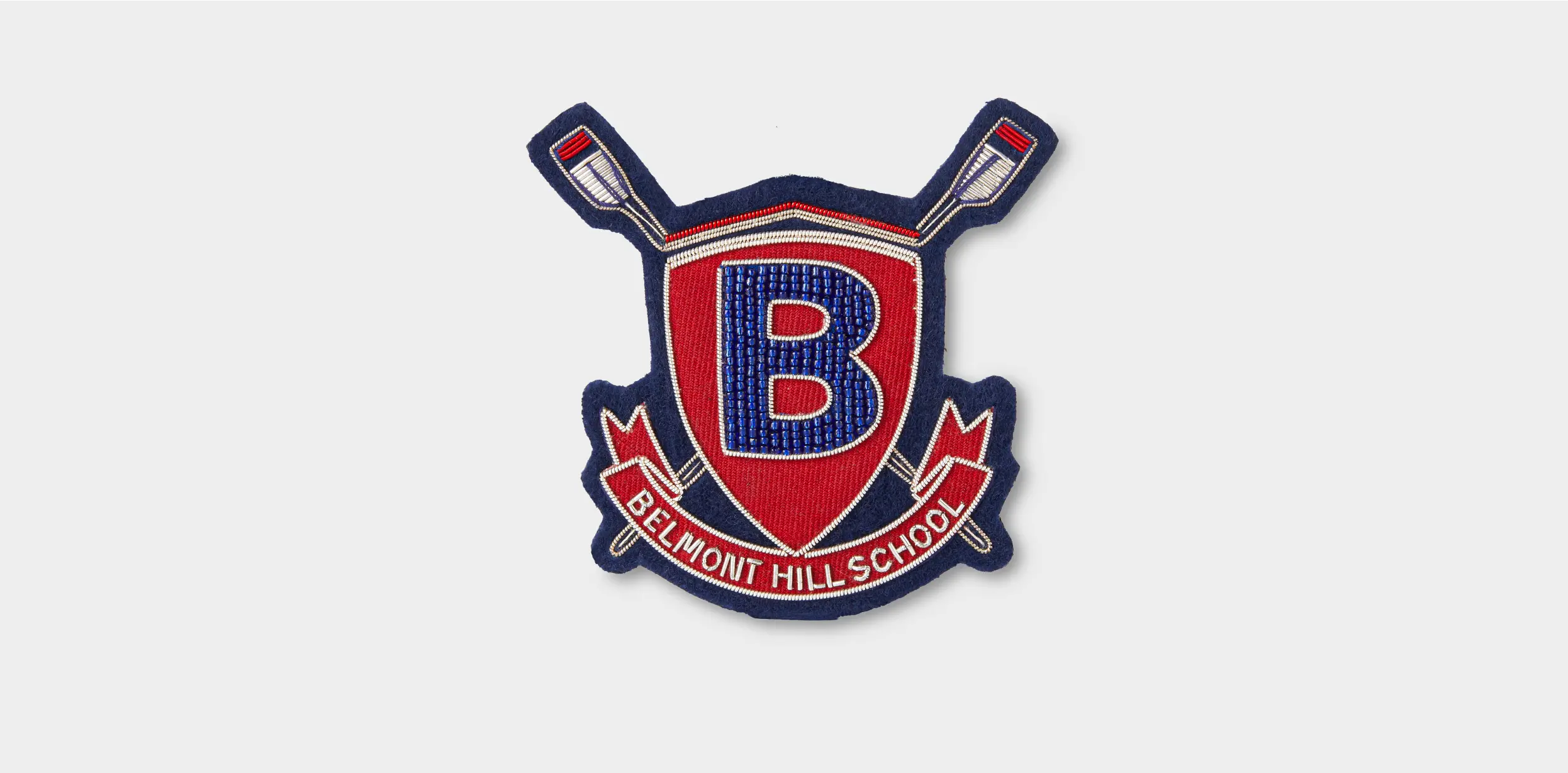 Bullion patch for Belmont High School, featuring school colors and intricate stitching for a distinguished look.