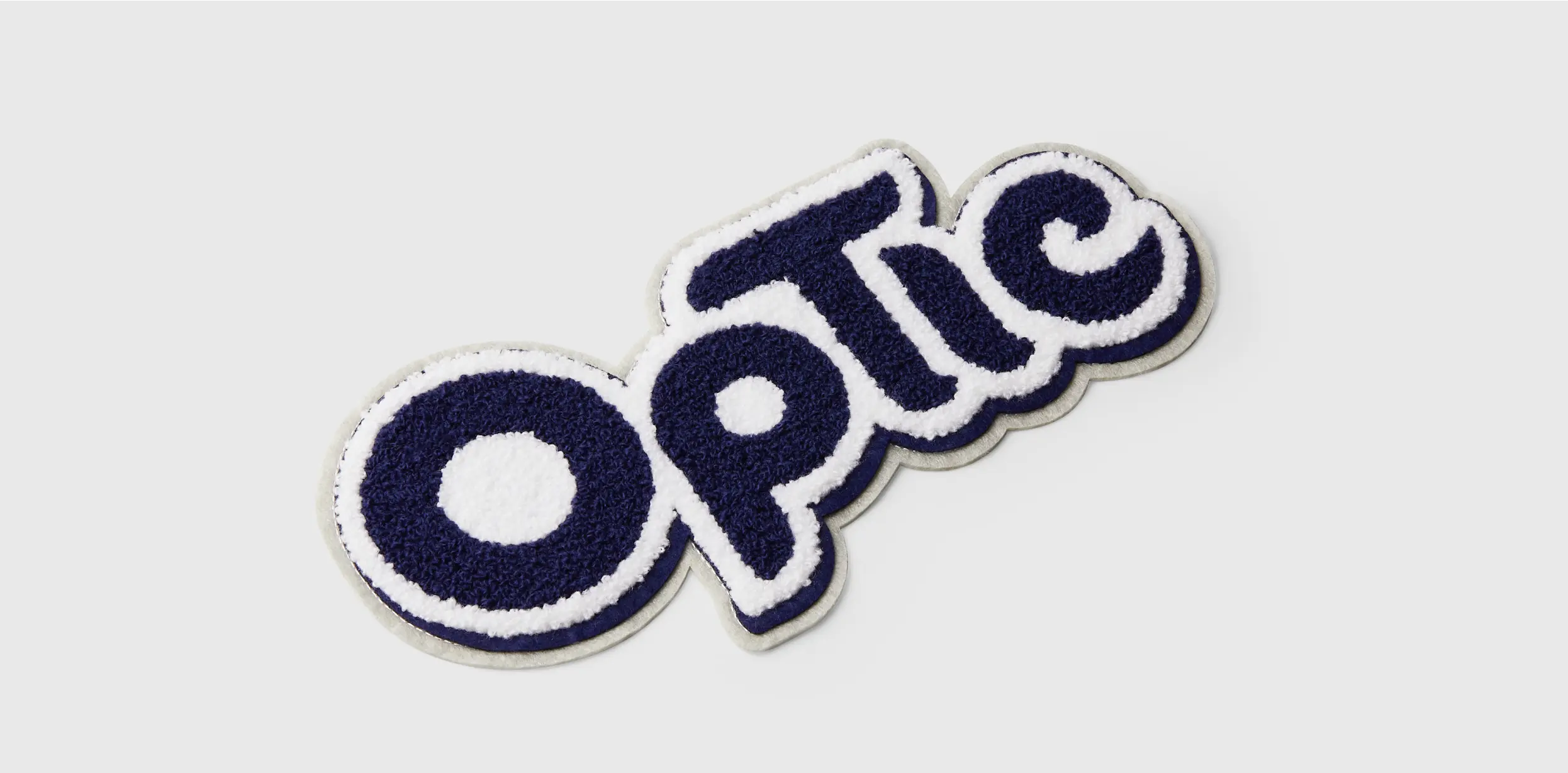 Custom chenille patch for an OpTic brand, showcasing vibrant colors and textured design elements.