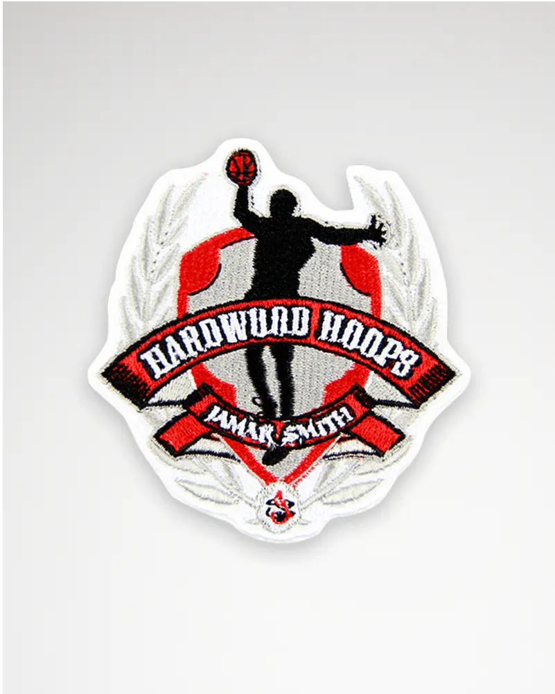 Sport embroidered patch featuring a basketball design, showcasing detailed stitching and vibrant colors.