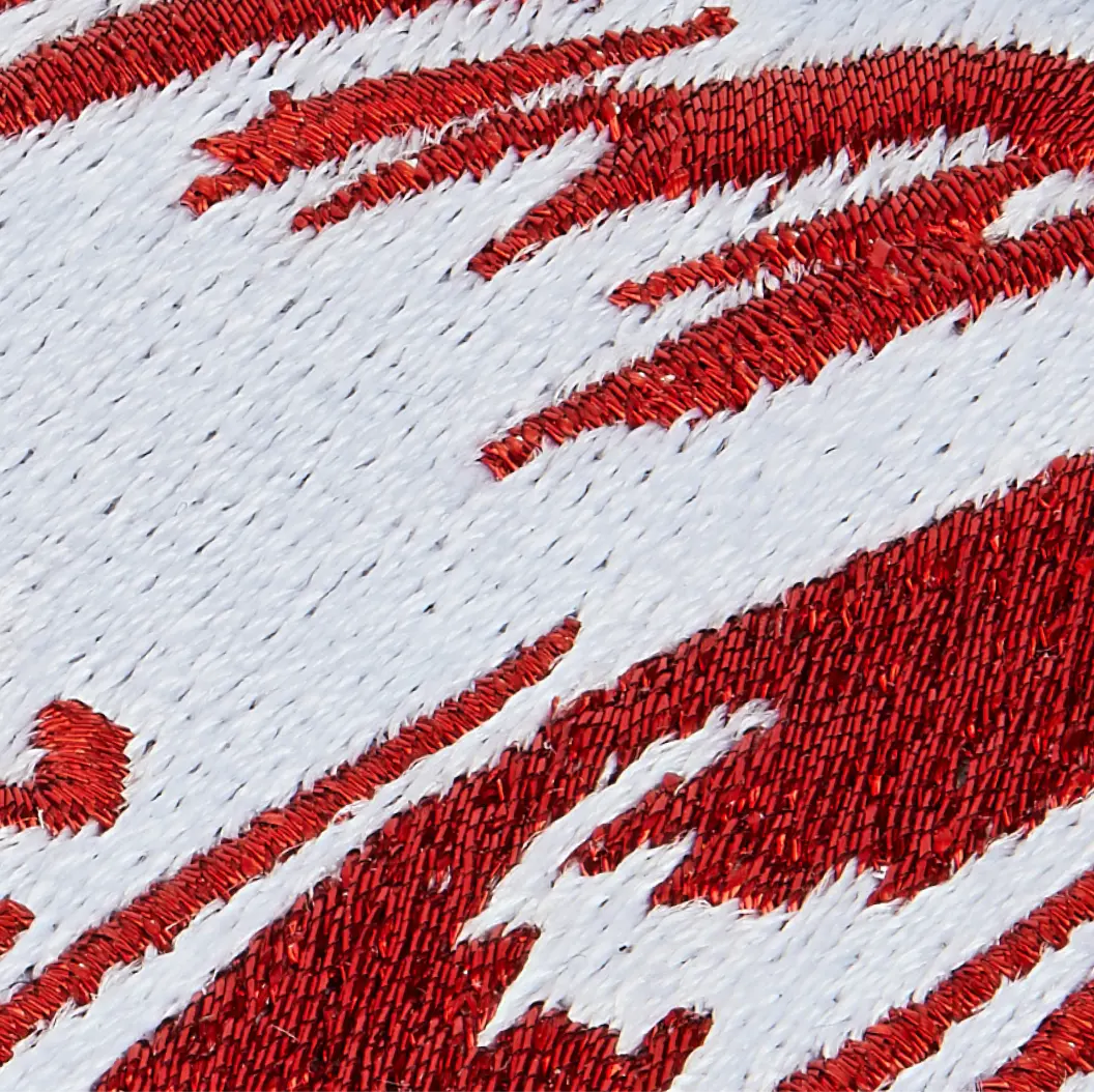 Close-up of premium thread option on an embroidery patch, showcasing texture.