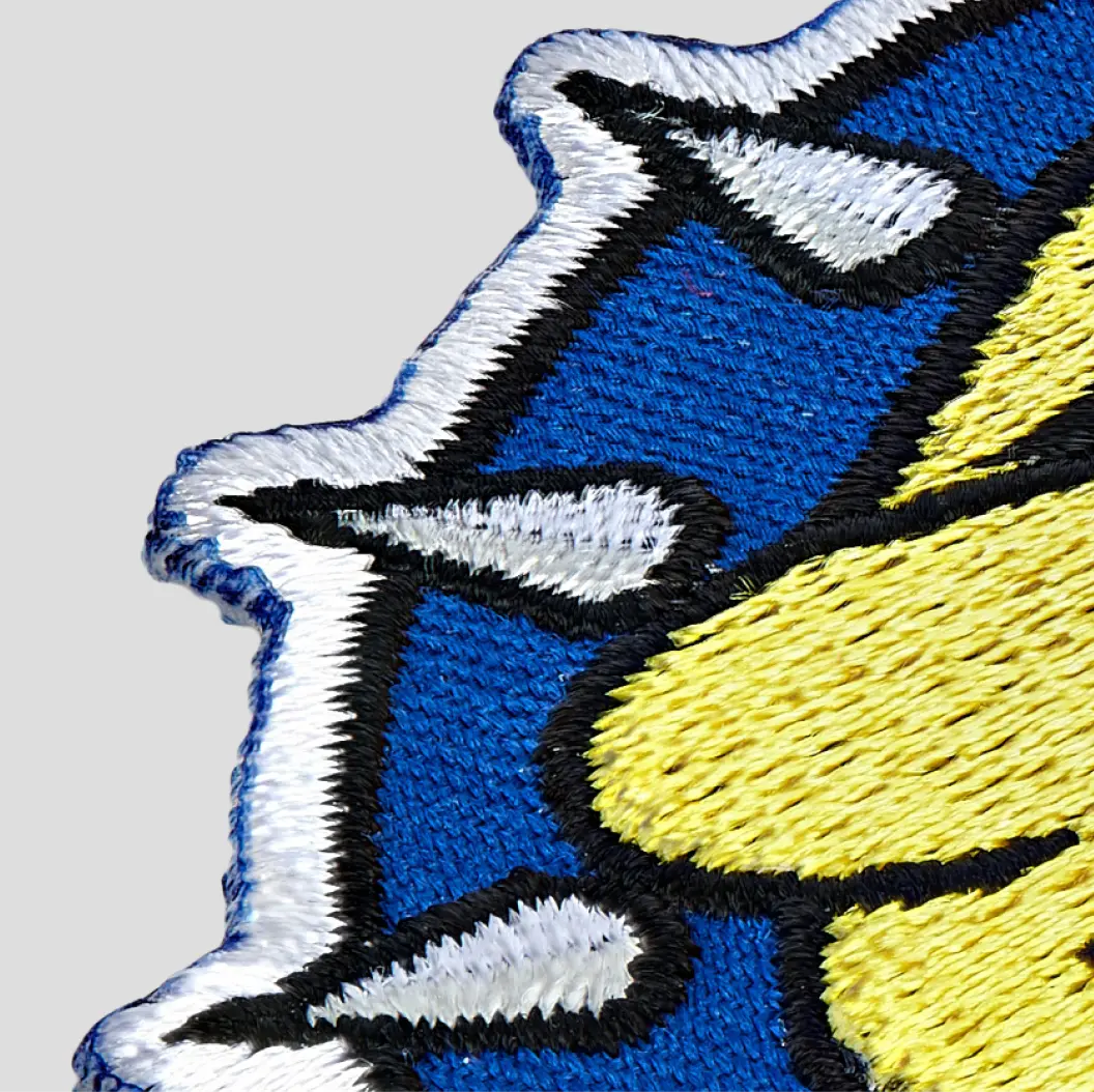 Close up of an embroidered patch, showcasing a customized edge