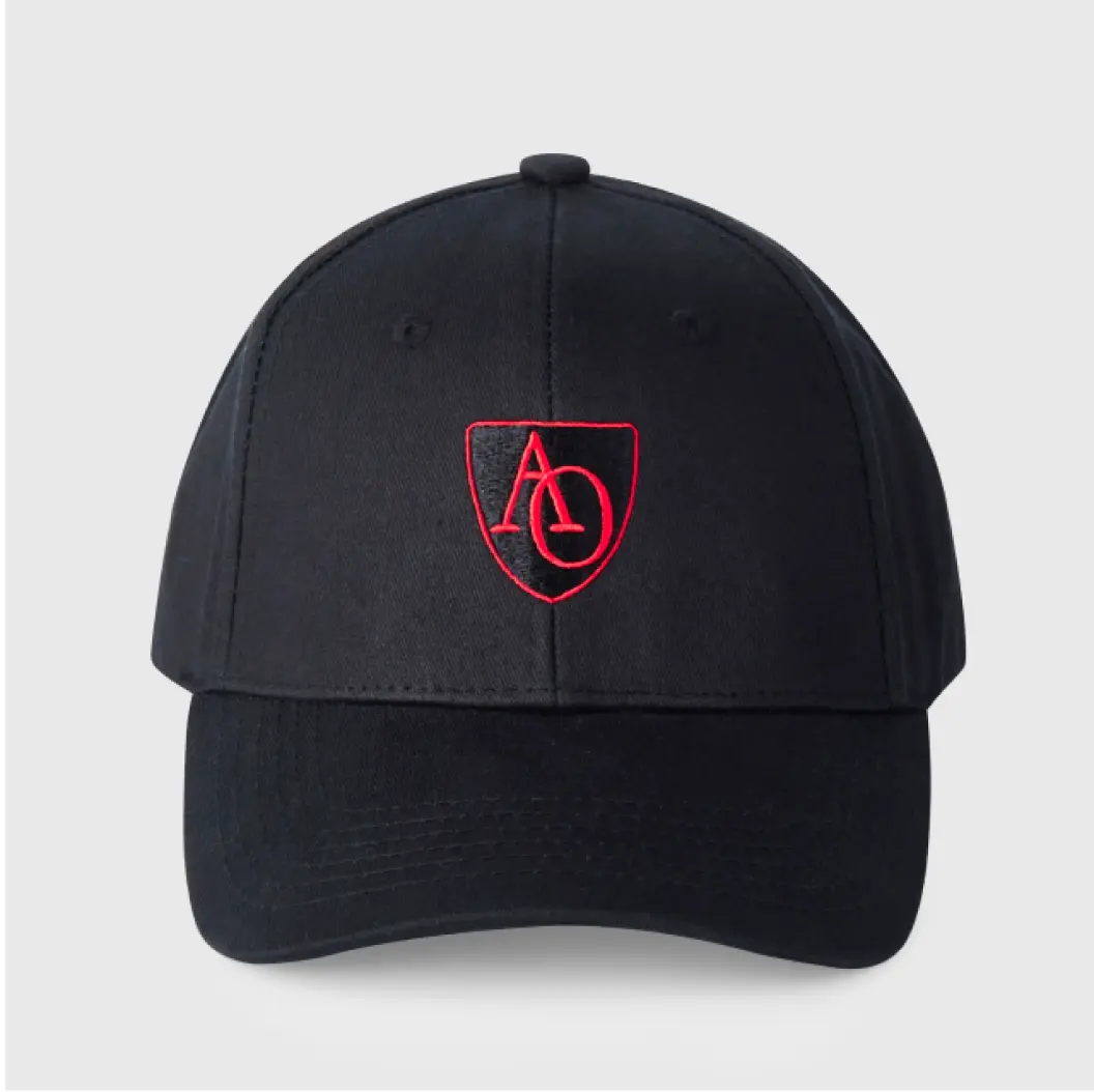 Black cap with a red embroidered logo design in the center.