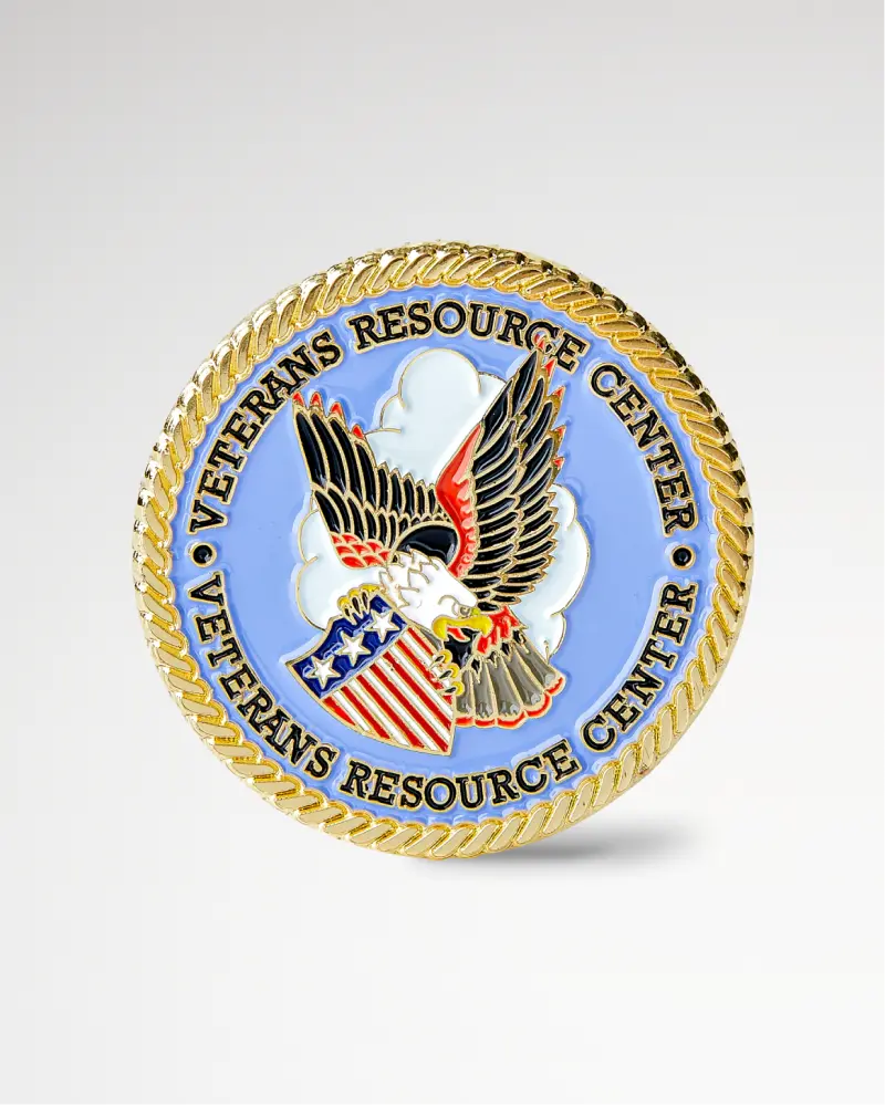 Gold custom coin with a flying eagle and “Veterans Resource Center” inscription.