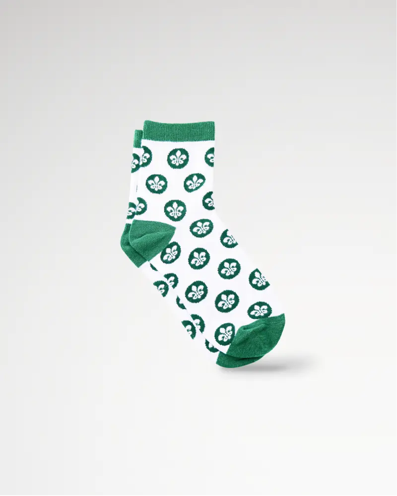 White and green socks featuring a repeated circular pattern