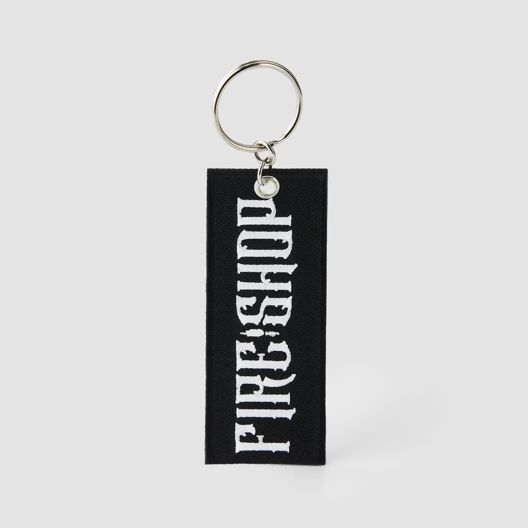 Embroidered keychain style featuring vibrant designs and intricate stitching, perfect for personalization and branding.