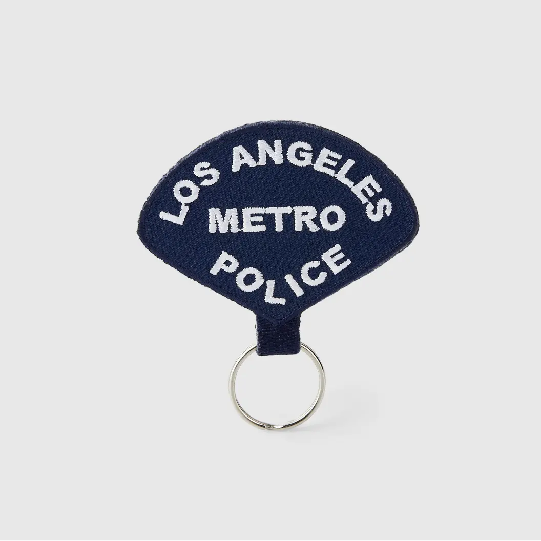 Embroidery coverage on a Metro Police keychain, showcasing detailed stitching and vibrant colors for visibility.