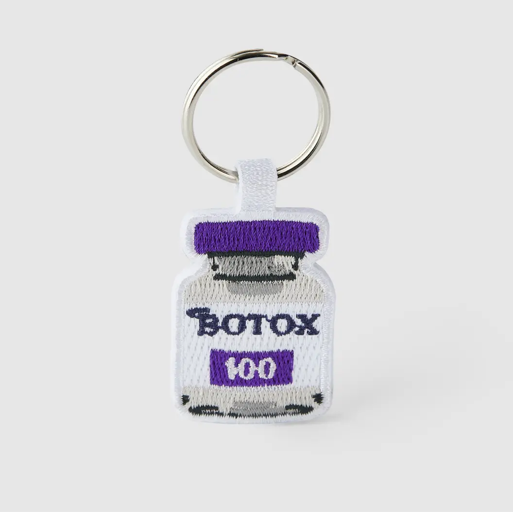 Attachment type for embroidered keychain, offering various options for secure and convenient use.