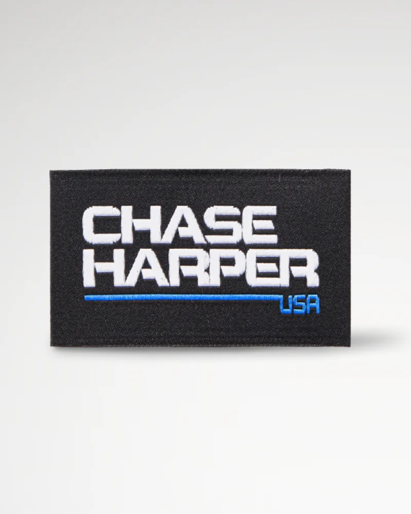 Woven label in black featuring clear white text, offering a sleek and stylish design.