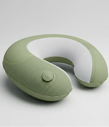 Contoured neck pillow with integrated closure and precision ergonomic shaping