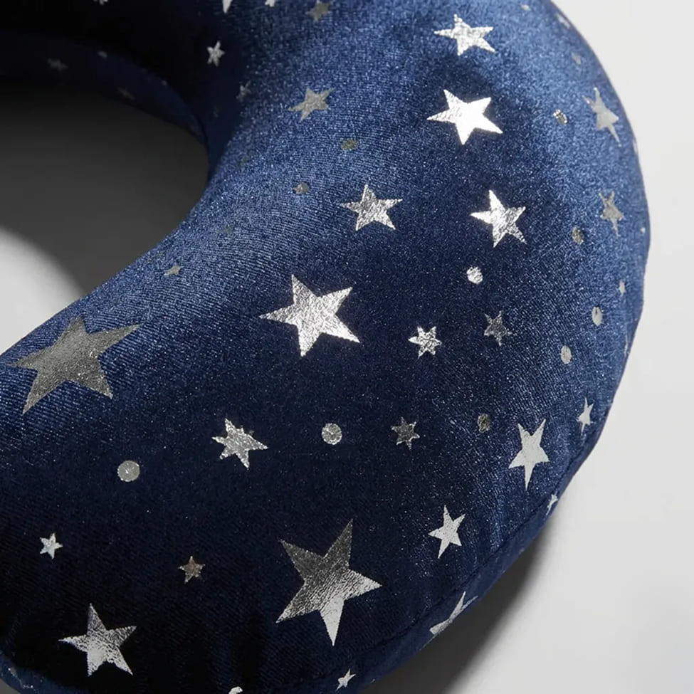 U-shaped neck pillow with starry printed fabric cover and structured contour support
